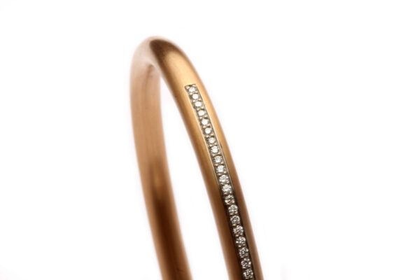 Armreif in Roségold und Platin mit Diamanten